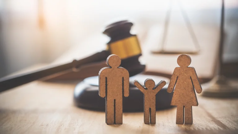 picture of small family icons and a gavel